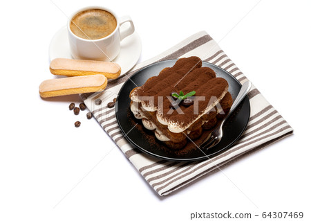Classic tiramisu dessert on ceramic plate, savoiardi cookies and cup of coffee isolated on white background with clipping path 64307469
