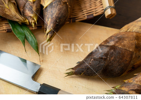 Bamboo shoots on a cutting board Bamboo shoots on a cutting board 64307811