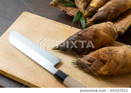 Bamboo shoots on a cutting board Bamboo shoots on a cutting board 64307813