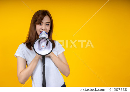 Young Asian woman in white casual t-shirt looking Young Asian woman in white casual t-shirt looking 64307888