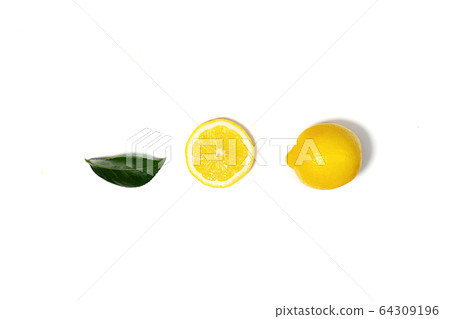 Creative layout made of lemon and green leaf. 64309196