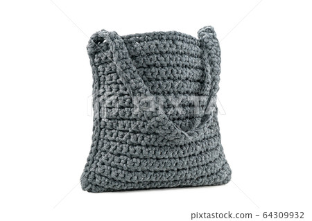 gray knitted handmade bag on white gray knitted handmade bag on white 64309932