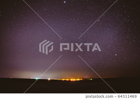 Real Night Sky Stars Background With Natural Colourful Sky Gradient. Sunset, Sunrise Light And Starry Sky Over Horizon Real Night Sky Stars Background With Natural Colourful Sky Gradient. Sunset, Sunrise Light And Starry Sky Over Horizon 64311469