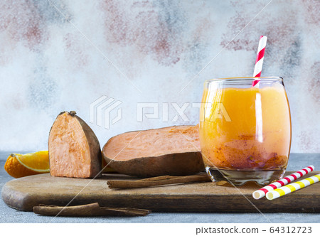 Sweet Potato Smoothie coctail with Cinnamon. Gluten-free, healthy food concept Sweet Potato Smoothie coctail with Cinnamon. Gluten-free, healthy food concept 64312723