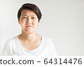 A portrait of Asian 40s woman with freckles, wrinkles and furrow on face; smile and looking forward. 64314476
