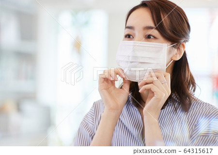 Business woman with mask Japanese woman 64315617