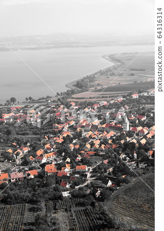 Aerial view of Pavlov village from Devin mountain on banks of Nove Mlyny water reservoir, Breclav district, South Moravia, Czech Republic, sunny summer day Aerial view of Pavlov village from Devin mountain on banks of Nove Mlyny water reservoir, Breclav district, South Moravia, Czech Republic, sunny summer day 64316314
