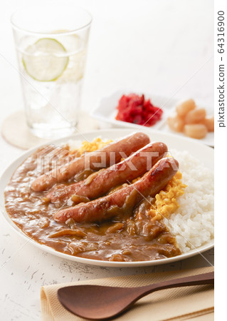 Curry rice topped with sausage and scrambled eggs 64316900