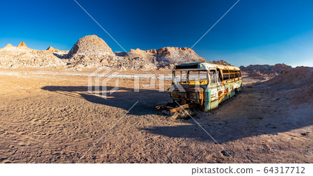 Panorama of abandoned bus in the desert of Atacama, Chile Panorama of abandoned bus in the desert of Atacama, Chile 64317712