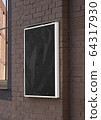 Blank black glass rectangular poster mock up brick wall mounted 64317930