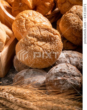 A variety of bread put together in a pile A variety of bread put together in a pile 64318871