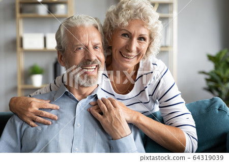 Head shot portrait smiling older wife and husband at home Head shot portrait smiling older wife and husband at home 64319039