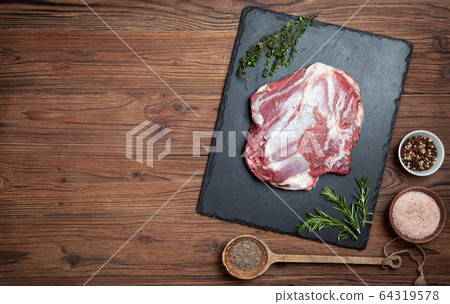 Raw leg of lamb 64319578