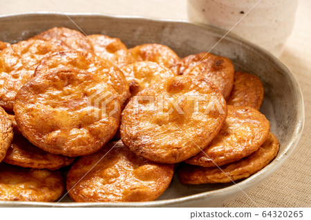 Soy sauce rice cracker. 64320265