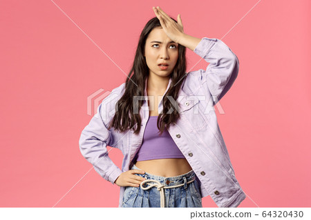 Portrait of sick and tired, annoyed young stylish girl taking care of new employee, facepalm, do eye roll and punch forehead sighing bothered, have lots of troubles, stand pink background 64320430