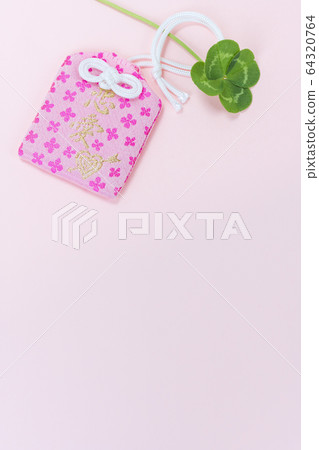 Amulet and four leaf clover 64320764