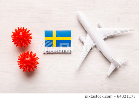 Flight ban and closed borders for tourists and travelers with coronavirus covid-19. Airplane and flag of Sweden on a white background. Coronavirus pandemic. Flight ban and closed borders for tourists and travelers with coronavirus covid-19. Airplane and flag of Sweden on a white background. Coronavirus pandemic. 64321175