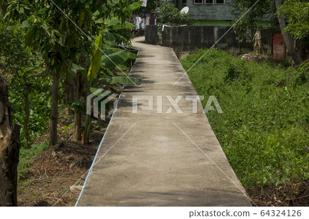 Long concrete walkway 64324126