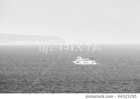 Baltic Sea ferry sails into the fog 64325295