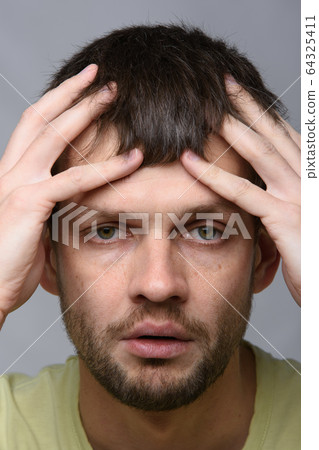 Close-up portrait of a sick man of European Close-up portrait of a sick man of European 64325411