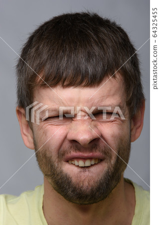 Close-up portrait of a male imitating hare of 64325455