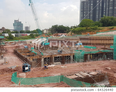 Building substructure and super-structure under construction using the open-cut method. It is commencing after the foundation stage using the conventional method 64326440