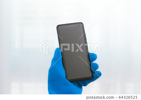 woman hands holding smartphone woman hands holding smartphone 64326525