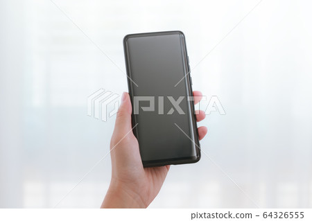 woman hands holding smartphone woman hands holding smartphone 64326555