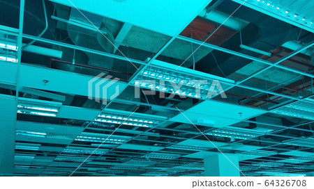 Suspended ceiling frame and board under construction at the construction site. Electrical and mechanical fitting installation work also on going.  64326708
