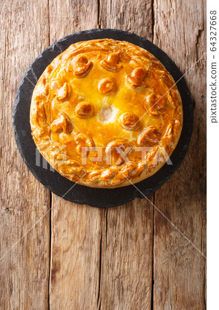 Festive Russian Kurnik sliced pie stuffed with 64327668