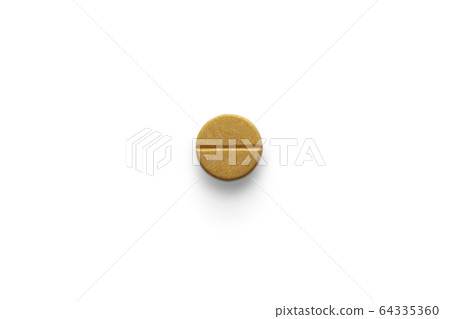 Single orange color pill of vitamin c on white Single orange color pill of vitamin c on white 64335360