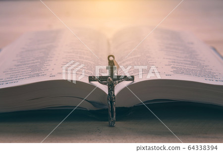 Christian man Bible study. Bible, books and guitar 64338394