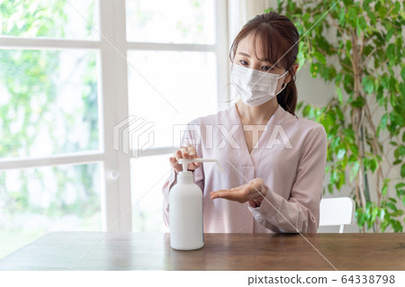 Disinfection woman Disinfection woman 64338798