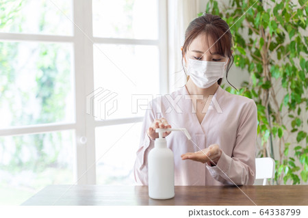 Disinfection woman Disinfection woman 64338799