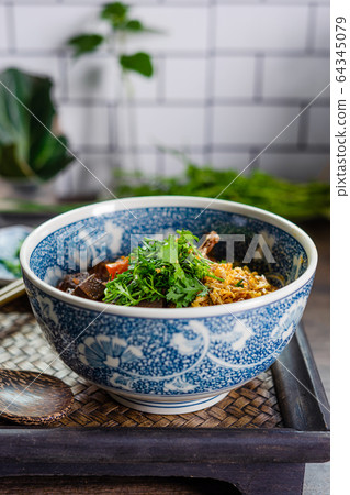 Rice noodles with spicy pork sauce (Nam ngiao)  64345079