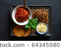 ingredient of thai spicy soup in ceramic bowl. 64345080
