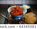 ingredient of thai spicy soup in ceramic bowl. 64345081