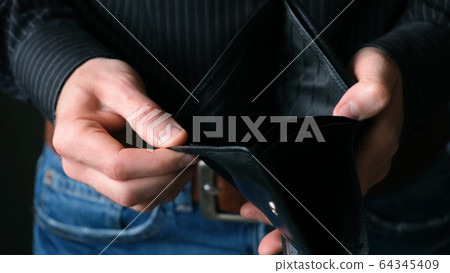 Empty Wallet In Male Businessman Hands Empty Wallet In Male Businessman Hands 64345409