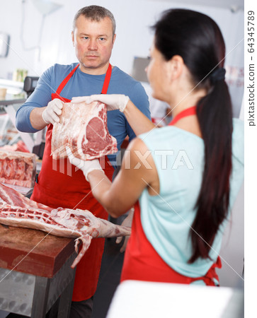 Positive sellers discussing of quality meat Positive sellers discussing of quality meat 64345789