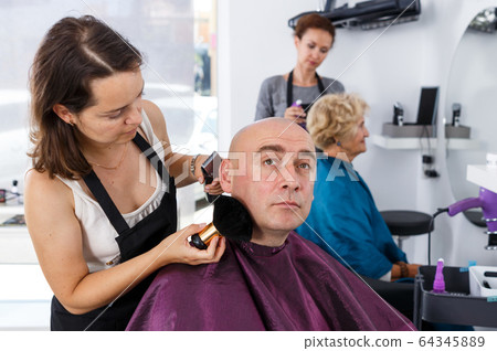 Male client in barber salon Male client in barber salon 64345889