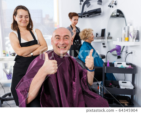Happy man after haircut Happy man after haircut 64345904