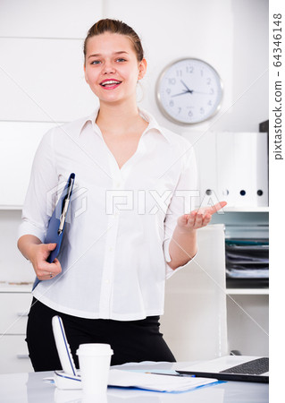 Woman is talking with partner before signing documents 64346148