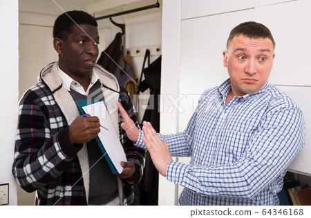 Men talk about services at doorstep and having conflict Men talk about services at doorstep and having conflict 64346168