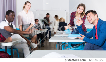 Adult students during recess Adult students during recess 64346172