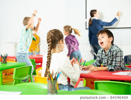 Happy kids during break at school Happy kids during break at school 64346409