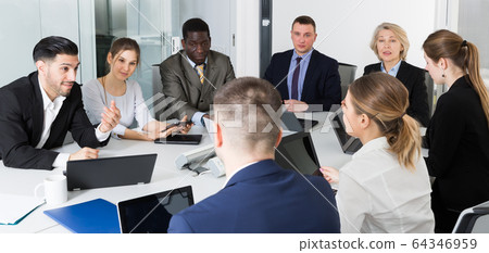 business partners discuss ideas for teamwork 64346959