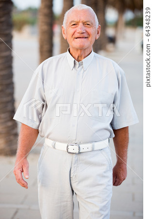 man walking in the park at weekend man walking in the park at weekend 64348239