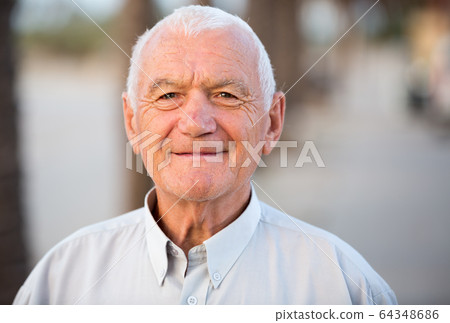 positive mature man in the park positive mature man in the park 64348686