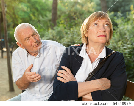 Elderly woman offended by her husband 64348959