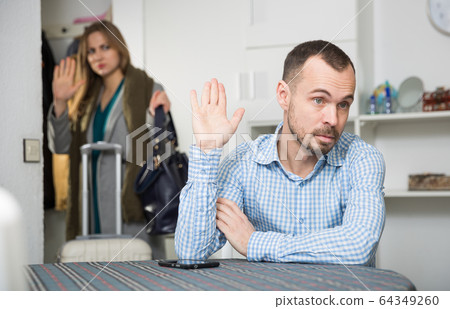 Man upset because of his wife leaving 64349260